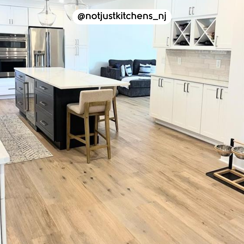 Canadian Urban Oak RKP8116 floors in a white kitchen; photo credit: @notjustkitchens_nj